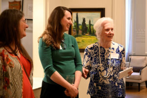 Andria Derstine, Director of The Allen Memorial Art Museum, Oberlin College, with Starr at the Cosmos Club Exhibit